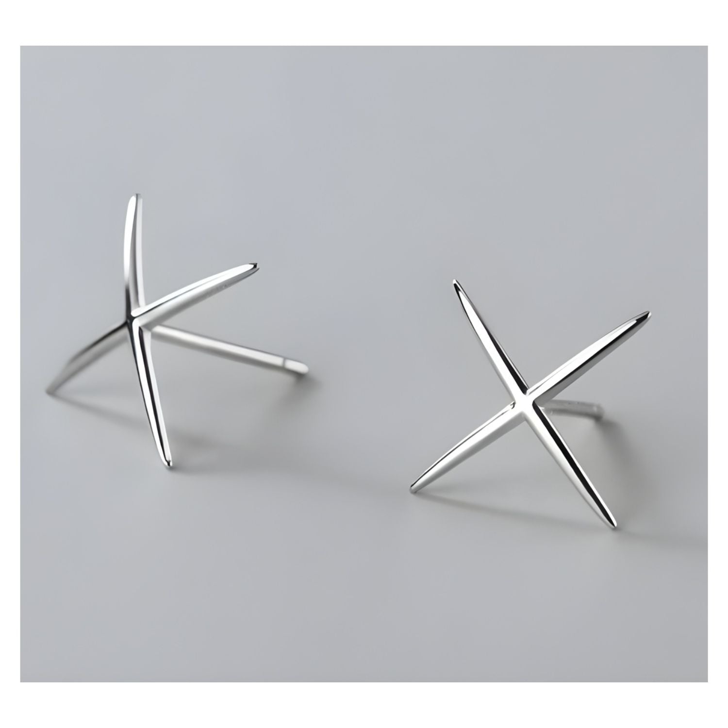 Clous d'oreilles Croix Argent