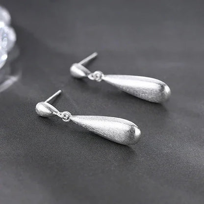 Boucles d’Oreilles Pendantes Goutte en Argent
