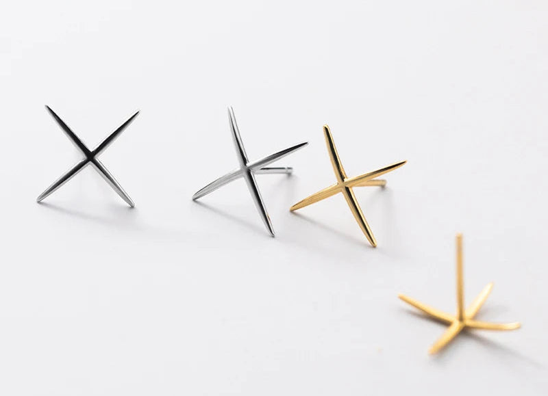 Clous d'oreilles Croix