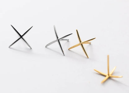 Clous d'oreilles Croix